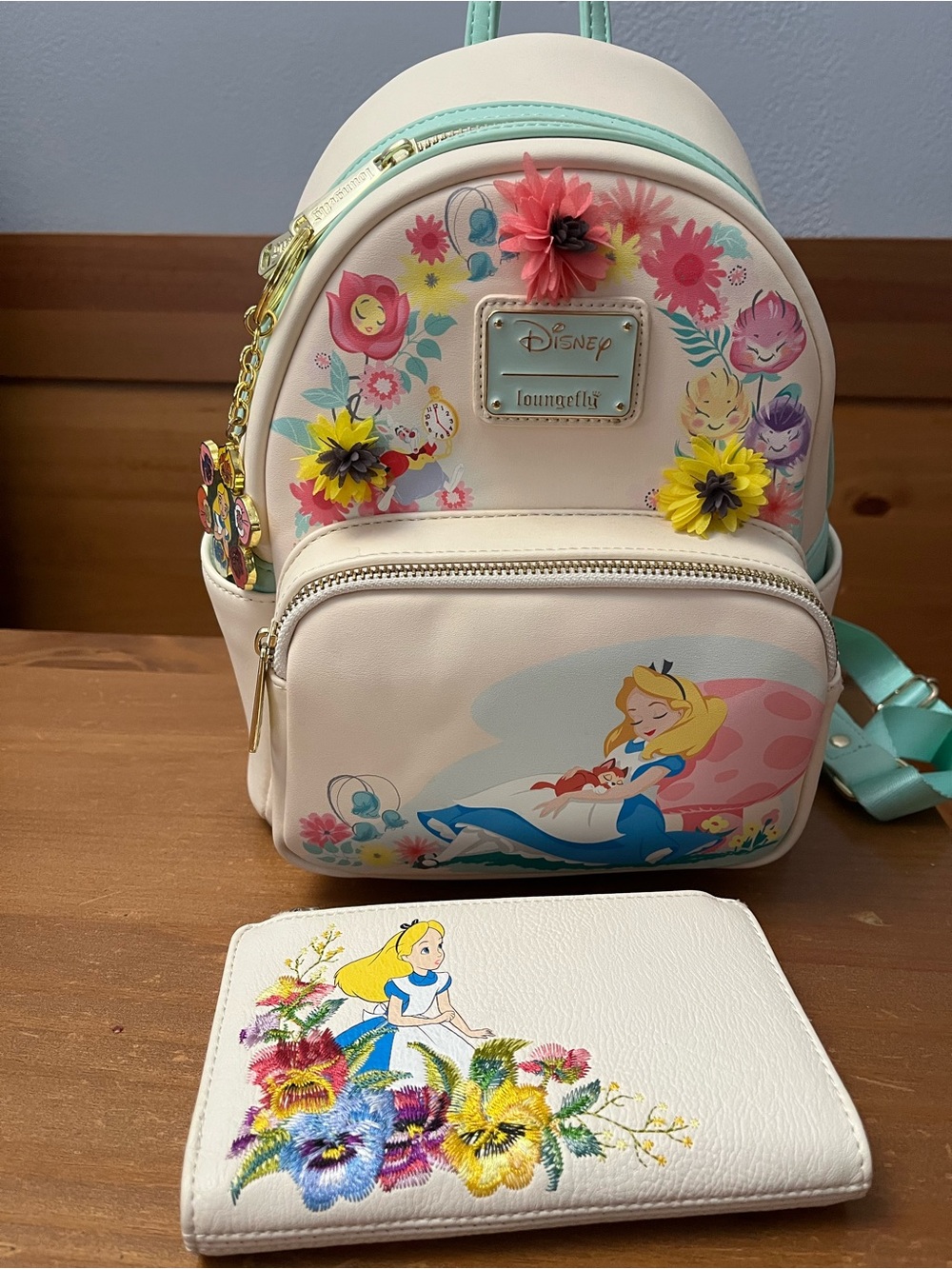Alice in wonderland loungfly backpack, keychain and wallet